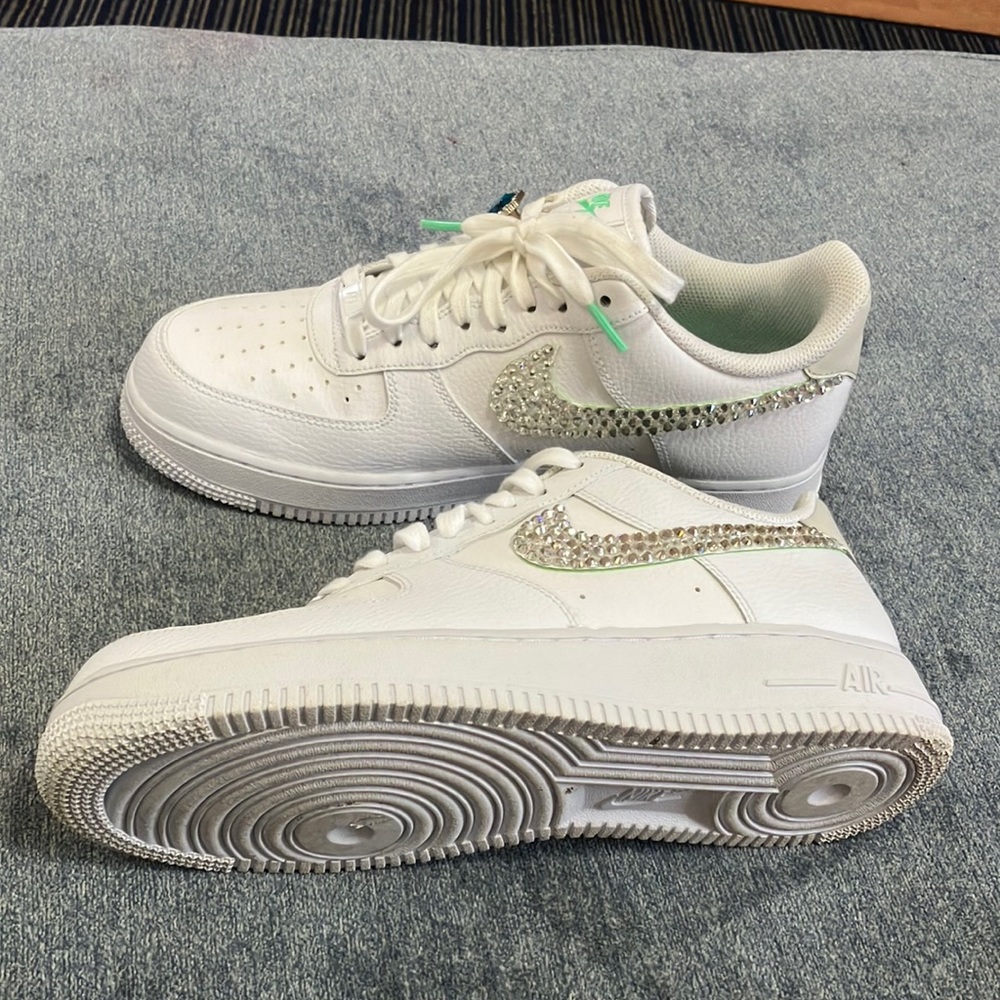 Customized bedazzled white Air Force 1’s